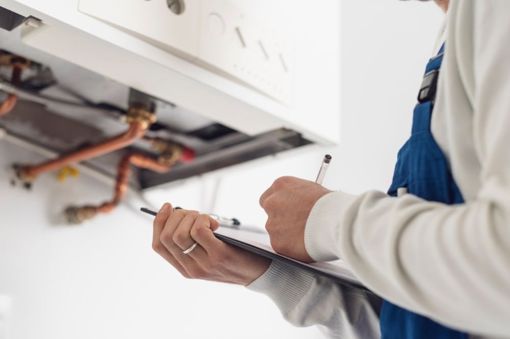 Why Having a Clean Building or Space Truly Matters Professional Plumber Doing A Boiler Check 6MYA3MF 1
